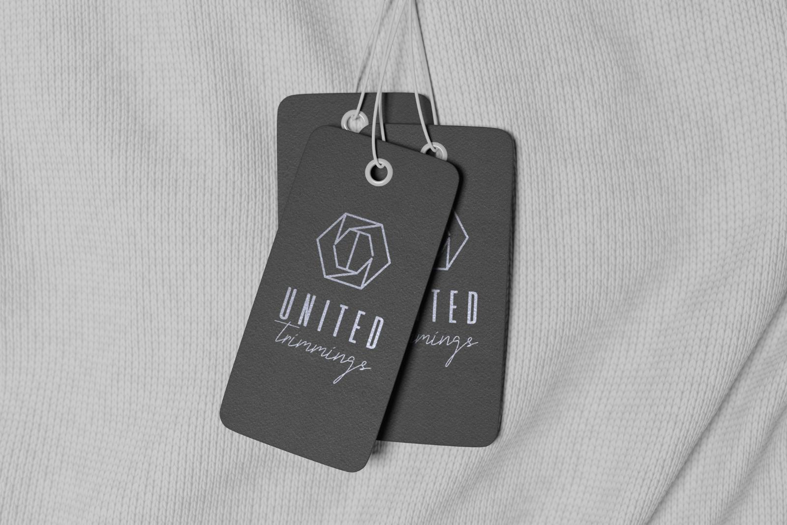 United Trimmings hangtags on a knitted garment